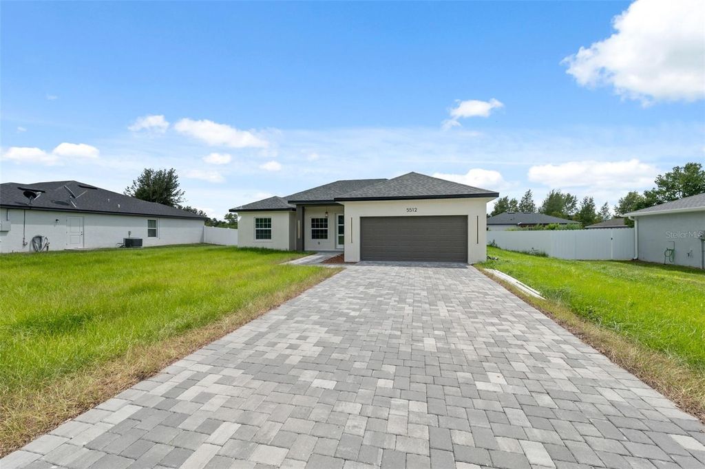 Photo of 5512 SW 150th Lane, Ocala, FL 34473 (MLS # O6343084)