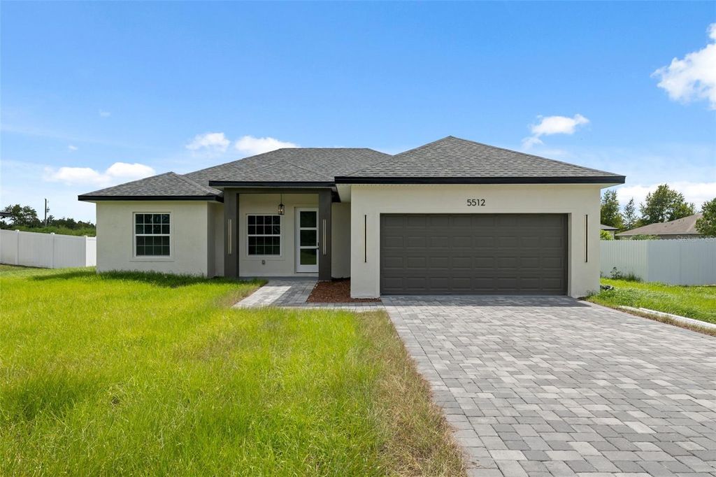 Photo of 5512 SW 150th Lane, Ocala, FL 34473 (MLS # O6343084)