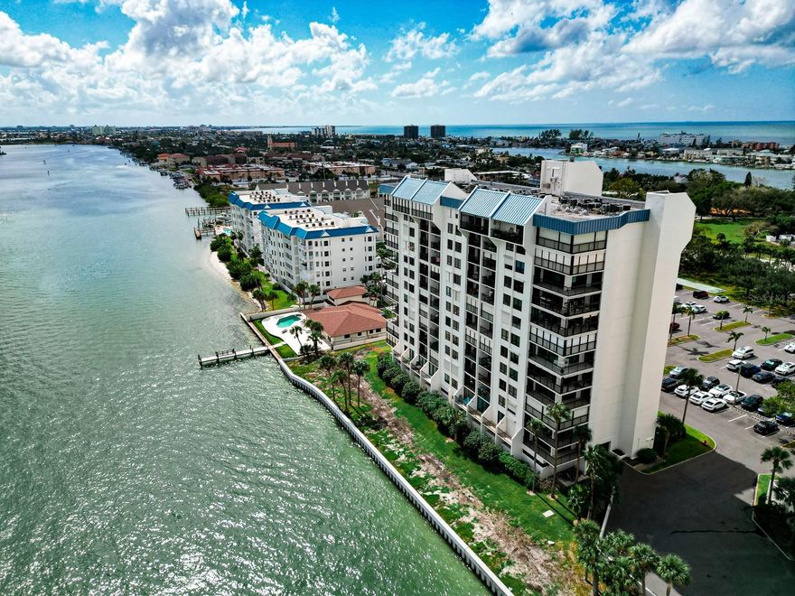 Breathtaking 360º views from this 10th-floor 2-bedroom, 2-bath condo in the highly sought-after gated community of St. Pete Yacht and Tennis Club. Located in one of the most desirable buildings closest to the ICW, this spacious 1,160 sq ft residence offers panoramic vistas of both the sparkling Gulf and the peaceful Intracoastal, with a daily no-wake boat parade and frequent sightings of dolphins and manatees. The open-concept design features a large opened kitchen with plenty of counterspace and storage, two oversized bedrooms with king beds and space for desks or seating, renovated bathrooms with walk-in showers, and a walk-in closet in the primary suite. Enjoy both Gulf and Intracoastal views from the kitchen, living room, and primary bedroom, with access to a large private balcony perfect for dining or relaxing. The community offers resort-style amenities including a heated waterfront pool and spa, fitness center overlooking the water, clubhouse with ballroom and grilling deck, world-class clay tennis and pickleball courts, and a marina. All this, just a short distance to the beach,
restaurants, and local shops—this condo offers an unbeatable lifestyle in a prime location—priced competitively, furnished, and
ready to enjoy before market rises and in time for winter.