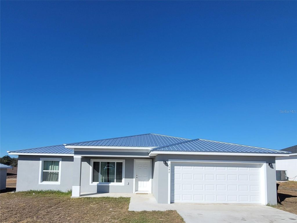 Photo of 3248 SW 149th Terrace, Ocala, FL 34481 (MLS # OM718356)