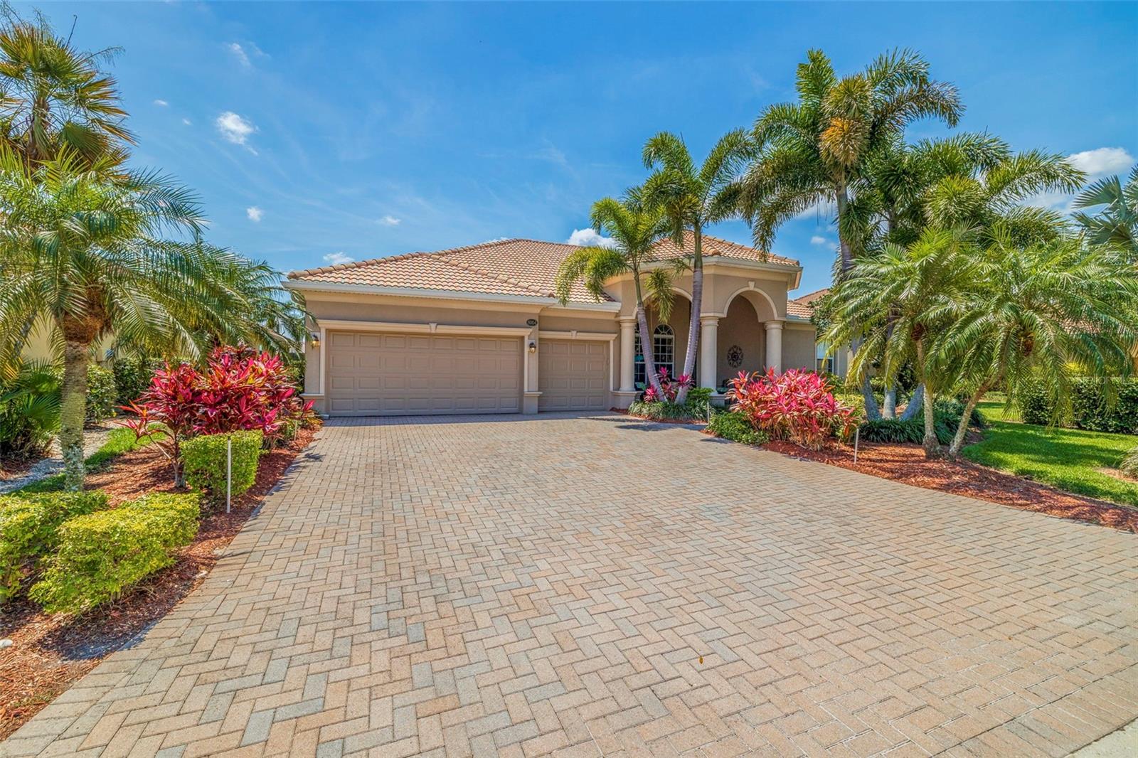 Experience resort-style living at its finest in the River Strand Golf & Country Club, a sought-after golfing community within Heritage Harbour. This golf-deeded property offers the ultimate blend of luxury, convenience, and maintenance-free living.
Step inside this meticulously maintained 4-bedroom, 3-bath home, showcasing Lennar's highly desirable Doral design with an expansive open floor plan. Every detail has been thoughtfully curated, from custom motorized shades in the primary bedroom to elegant crown molding, tray ceilings, and designer light fixtures. The soaring 10-foot high volume ceilings and 18-inch diagonal ceramic tile flooring create an inviting and airy atmosphere.
Designed for entertaining, the chef’s kitchen features a breakfast bar, stainless steel appliances, granite countertops, and all-wood cabinetry, with the added convenience of pull-out shelving in all base cabinets. The luxurious master suite is a private retreat with motorized shades, a walk-in closet, a garden tub, and a spacious Roman-style walk-in shower.
Enjoy the best of Florida’s indoor-outdoor lifestyle on the expansive lanai, offering stunning golf course views. Take a refreshing dip in the heated saltwater pool and spa, with a brand-new pool heater for year-round comfort. Plus, enjoy peace of mind with a new AC UNIT (2023) and WATER HEATER (2021). Freshly epoxied 3 car garage.
As a resident of RIVER STRAND, you’ll have access to world-class amenities, including a 27-hole championship golf course designed by Arthur Hills (golf membership included), 6 resort-style pools, including a resistance pool, a state-of-the-art fitness center, 8 Har-Tru lighted tennis courts & pickleball courts, a Tuscan-inspired clubhouse with a bar, restaurant, poolside tiki bar, billiards, and card rooms, and an auxiliary clubhouse for additional community activities
Perfectly situated near pristine Gulf Coast beaches, upscale shopping, fine dining, and easy access to I-75, this home is ideal for those seeking a luxurious yet low-maintenance lifestyle.
Schedule your private showing today and make this exceptional property your personal oasis!