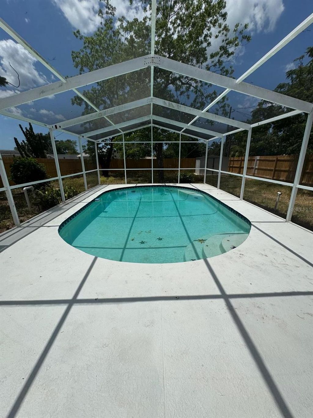 Photo of 12801 College Hill Drive, Hudson, FL 34667 (MLS # TB8371082)