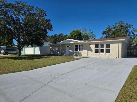 Photo of 12801 College Hill Drive, Hudson, FL 34667 (MLS # TB8371082)