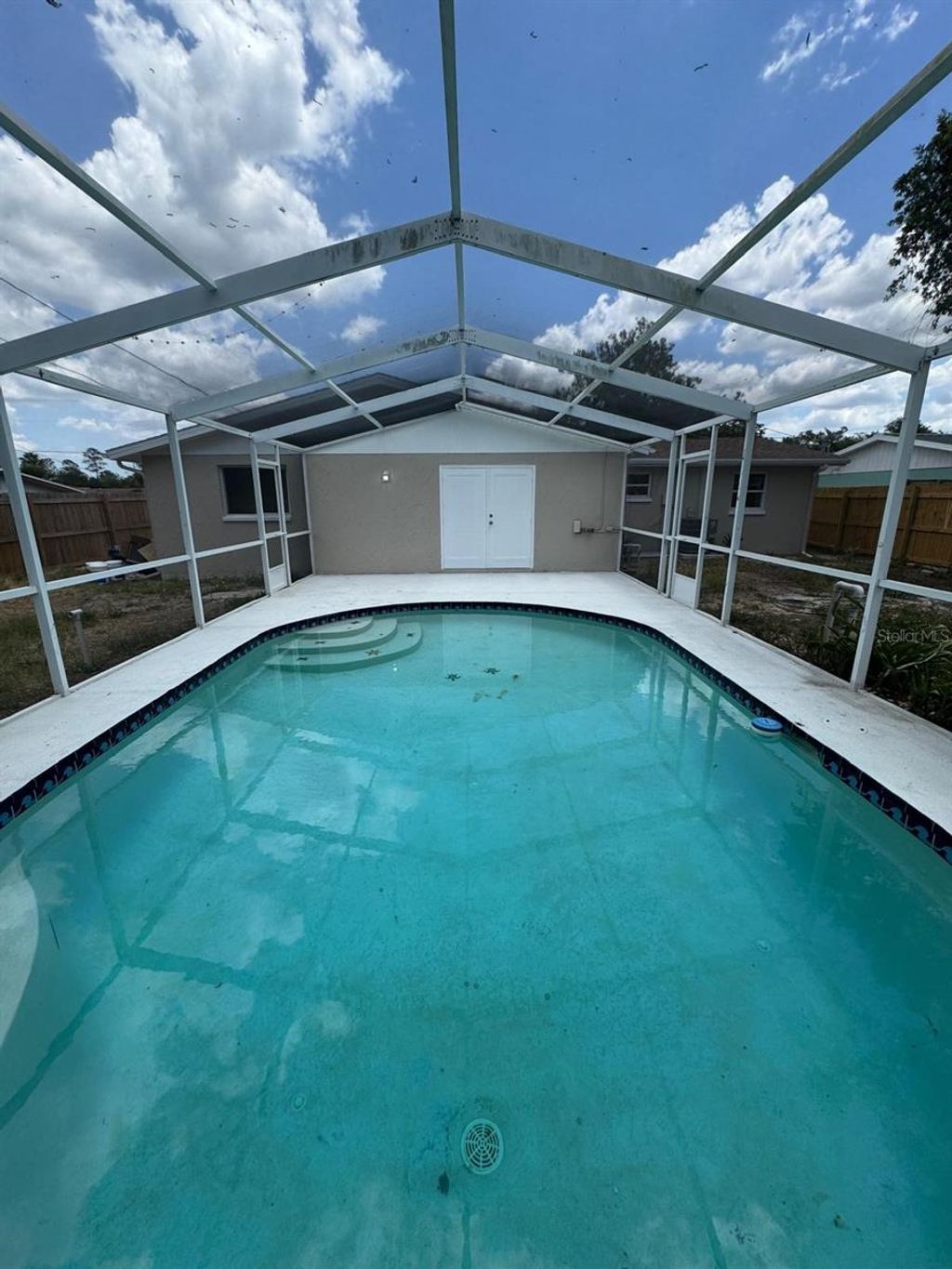 Photo of 12801 College Hill Drive, Hudson, FL 34667 (MLS # TB8371082)
