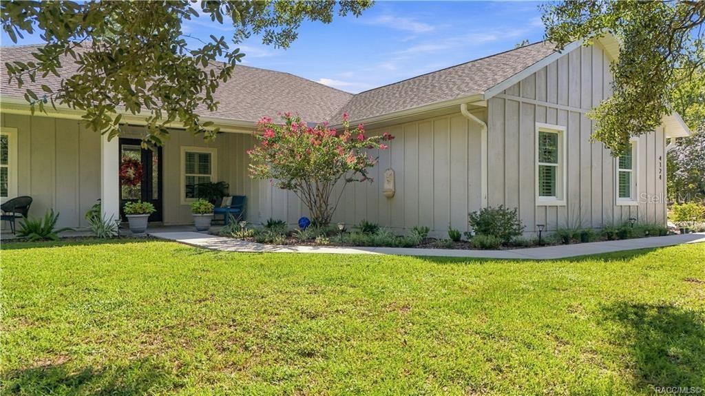 Photo of 4124 W Pine Ridge Boulevard, Beverly Hills, FL 34465 (MLS # TB8550618)