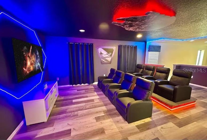 This beautifully renovated six-bedroom, 4.5-bath villa is located in the sought-after Windsor at Westside Resort, just a short walk to the community clubhouse. Designed for comfort and entertainment, the home features multiple themed bedrooms, including fantasy-inspired designs, and a private Star Wars-themed cinema room ideal for family movie nights.

The open floor plan offers spacious living areas, king suites, and bunk bedrooms, accommodating up to 15 guests. Outdoors, enjoy a private sun-filled pool perfect for relaxing after a day at the parks.

Conveniently located approximately 12 minutes from Walt Disney World® and close to major Orlando attractions, this property also includes access to resort-style amenities such as a clubhouse, pools, lazy river, fitness center, game room, and on-site dining options.

Ideal as a primary residence, second home, or income-producing short-term rental.