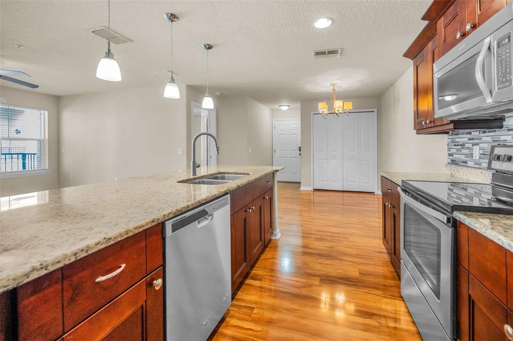 Photo of 5064 Royal Palms Way #204, New Port Richey, FL 34652 (MLS # TB8454049)