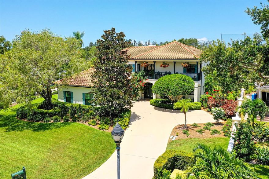 If you are looking for a newly renovated home, on the golf course, within walking or biking distance to all of the amenities at The Oaks Country Club, this is it. This charming home, on coveted Saint James Park, has everything you need to enjoy the country club lifestyle. The entry has a pergola, fountain, and beautiful leaded glass front doors. With three bedrooms, all en suite, three and ½  baths, a dining room, living room, family room and a library, this home has it all. The living room and family room and kitchen overlook the golf course, and two primary suites, one on the first floor and one on the second floor have beautiful views of the course as well.  Balconies open to all bedrooms and have climbing trellises and offer a peaceful respite. All bedrooms have new hardwood flooring, and new marble floors grace the kitchen and laundry room. The renovated kitchen has handsome solid wood cabinetry, new stainless appliances and a built in wine and coffee bar.  The refinished pool has a new retractable awning to enjoy the outdoors.  New hurricane impact windows, new landscaping and landscape lighting, and a 3 year new roof add to the special features of this wonderful home. The Oaks Country Club, one of the finest on the southwest gulf coast, offers two 18 hole golf courses, 12 HarTru lighted tennis courts, pickleball, croquet, dining, and year round social activities for all to enjoy.  Perfectly seated between downtown Sarasota and Venice Island, and fifteen minutes to the areas beautiful beaches this home is a must see. Social or Golf Membership is required!