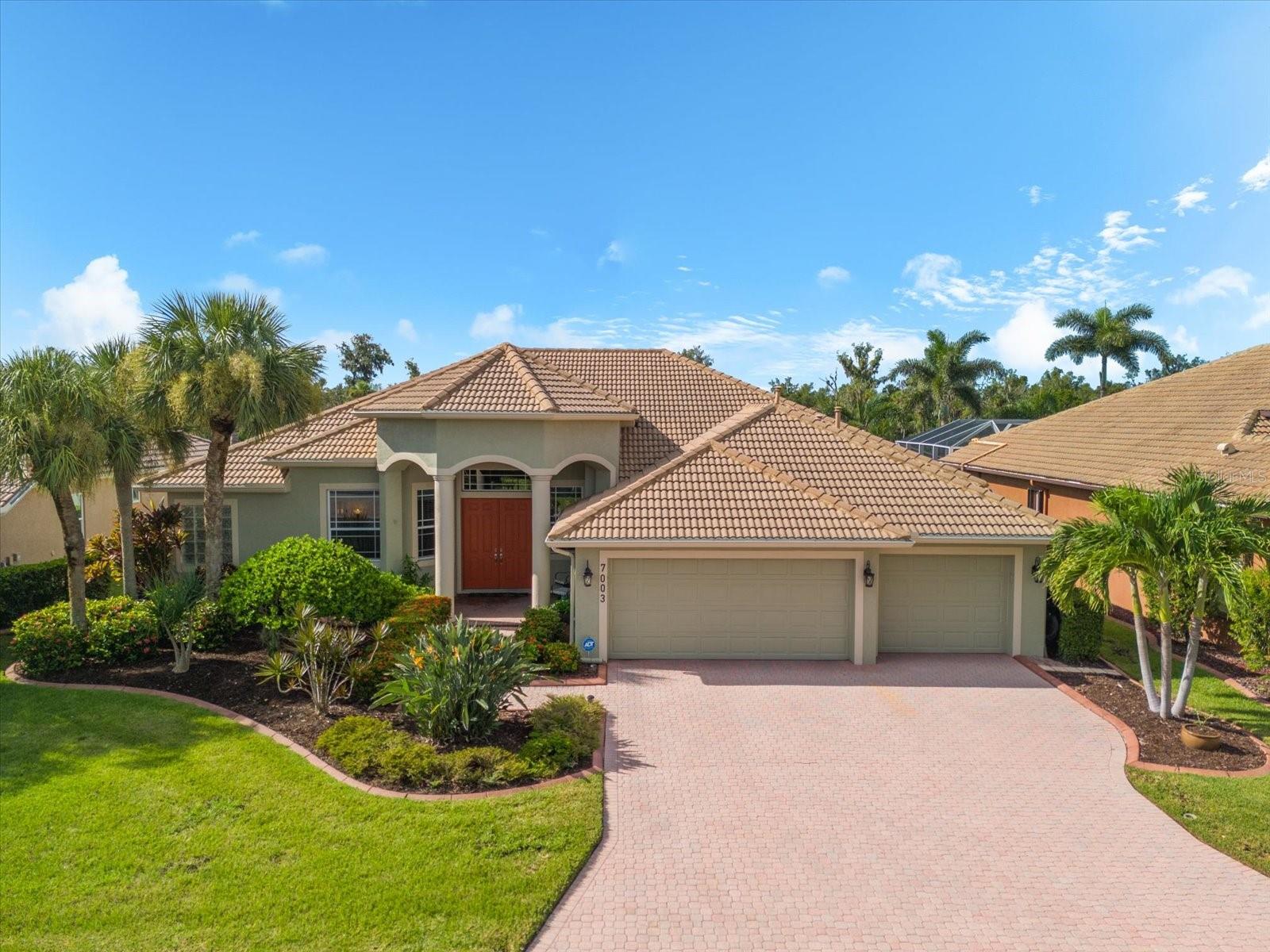 Welcome to River Place – Where Comfort Meets Style. This beautifully maintained 4-bedroom, 3-bath pool home offers 2,894 sq ft of spacious living in the desirable River Place gated community. From the manicured landscaping and freshly painted exterior to the large covered entry and expansive 3-car garage, this home is thoughtfully designed for relaxed Florida living. Step inside to a newly painted, bright open-concept floor plan with tile flooring throughout the main living areas. A home office with a new window and new sliders to the pool area and updated tile provides a flexible space for work or a quiet retreat. The generous living area flows beautifully to the screened lanai and private heated pool, ideal for indoor-outdoor enjoyment. The kitchen, perfect for both daily living and entertaining, features solid surface countertops, ample cabinetry, and stainless steel appliances. The spacious primary suite offers private pool access and a luxurious en-suite bath with soaking tub, walk-in shower, and dual vanities. Recent upgrades include: stainless steel kitchen appliances (2025), new pool pump and LED pool Lighting (2025), two new HVAC systems (2022), new water heater (2021), and new carpet in guest bedrooms (2022). As a resident of River Place, you’ll enjoy resort-style amenities, including a heated pool, fitness center, clubhouse, playground, and kayak launch — all with no CDD fees. Centrally located just minutes from I-75, UTC Mall, Lakewood Ranch, downtown Sarasota, and the Gulf Coast’s renowned beaches — this home offers the perfect blend of comfort, style, and convenience. Schedule your private showing today!