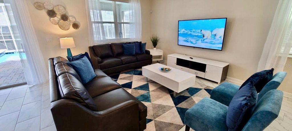 Photo of 1201 Challenge Drive, Davenport, FL 33896 (MLS # O6319610)