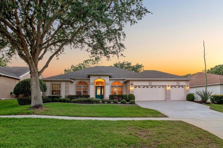 ***PREMIER GOLF FRONT HOME***SUNSET VIEWS! Welcome to this beautifully maintained 4-BEDROOM, 3-BATH EXECUTIVE RESIDENCE with a 3-CAR GARAGE,  ideally situated on the 18th HOLE in the highly sought-after GUARD-GATED community of LEGENDS GOLF & COUNTRY CLUB. Enjoy BREATHTAKING SUNSET VIEWS and RESORT-STYLE LIVING in one of Clermont’s premier golf communities. Designed with a desirable TRI-SPLIT OPEN FLOOR PLAN LAYOUT, this home offers expansive living spaces enhanced by soaring VAULTED CEILINGS, LARGE PICTURE WINDOWS, and SLIDING GLASS DOORS that fill the interior with NATURAL LIGHT. HARDWOOD and CERAMIC TILE FLOORING flow throughout most of the home, with carpet in the bedrooms and formal living areas. The gourmet kitchen is perfect for entertaining and features 42” CABINETRY with crown molding, GRANITE COUNTERTOPS, STAINLESS STEEL APPLIANCES, a PANTRY CLOSET, and a BREAKFAST BAR overlooking the SPACIOUS FAMILY ROOM/GREAT ROOM. The luxurious PRIMARY SUITE serves as a private retreat with PATIO ACCESS, DUAL CLOSETS, and an ensuite bath complete with a SOAKING TUB, SEPARATE SHOWER with updated glass enclosure, DUAL VANITIES w/MAKEUP COUNTER. Step outside to the expansive 33x14 COVERED/SCREENED LANAI— the perfect place to enjoy morning coffee or unwind while taking in SPECTACULAR EVENING SUNSETS over the golf course. Additional UPGRADES include RAIN GUTTERS, BRICK PAVER DRIVEWAY, IRRIGATION SYSTEM W/SMART timer, RING Doorbell & a NEWER top notch Lennox 18-SEER A/C SYSTEM (2024) with 10-year warranty & maintenance plan. Perfectly located within the Dearcroft at Legends neighborhood, this home is just a SHORT WALK to the CLUBHOUSE & RESORT-STYLE AMENITIES, including a POOL, SPA, KIDDIE POOL, SAUNA, FITNESS CENTER, TENNIS, PICKLEBALL, BASKETBALL COURTS, & PLAYGROUND. Conveniently located near the FL Turnpike, shopping, dining, South Lake Hospital, the Clermont Chain of Lakes, & Disney attractions. HOA includes BASIC CABLE, INTERNET, 24-HOUR GUARD-GATED SECURITY (No CDD). A rare opportunity to own a BEAUTIFULLY UPGRADED GOLF-FRONT HOME that perfectly blends LUXURY, COMFORT, AND LIFESTYLE. Schedule your private showing today!
Quality Upgrades include: Roof (2017), AC (2024), Hot Water Heater (2026)