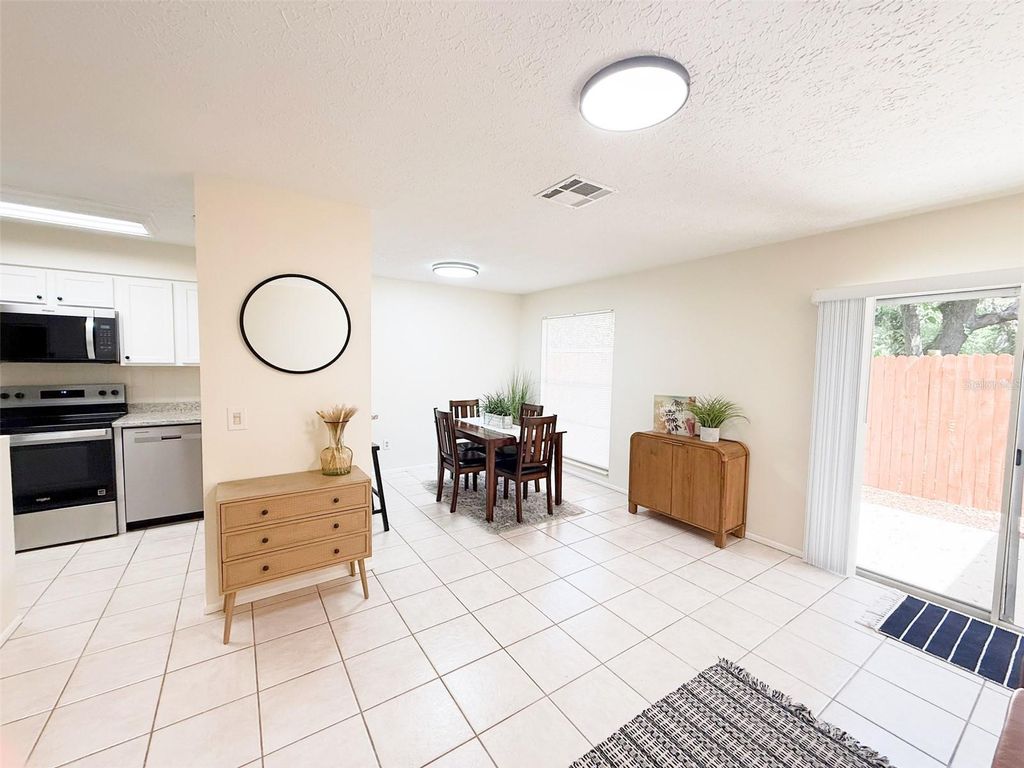 Photo of 9473 N Forest Hills Place, Tampa, FL 33612 (MLS # TB8387954)