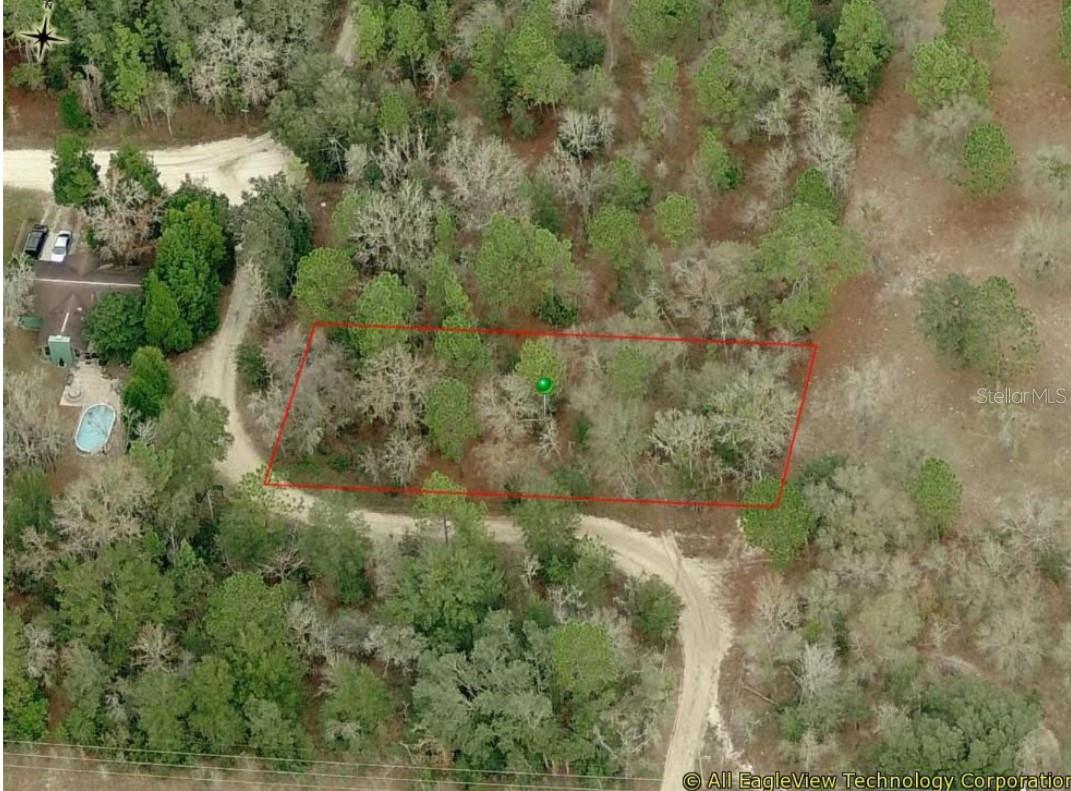 Discover a fantastic opportunity to own a 0.38-acre corner lot in Rainbow Estates Unit?2, a peaceful community just minutes from Dunnellon and Rainbow Springs State Park. This level, 85-foot by 196-foot parcel is wooded with mature trees, offering privacy and a natural setting that’s ideal for building your dream home or holding as a smart investment. Zoned RR-1 Rural Residential, the property allows single-family construction and light agricultural uses without strict homeowners’ association restrictions. Residents enjoy quick access to shopping, dining and recreational activities in Dunnellon, while major attractions such as Crystal River and the Gulf are less than half an hour away. With nearby properties appreciating in value and no association fees, this lot combines freedom, potential growth and the charm of Florida’s Nature Coast into a single, compelling package.