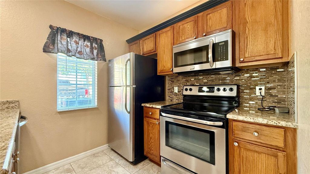 Photo of 4005 San Sebastian Drive #107, Kissimmee, FL 34741 (MLS # O6401950)
