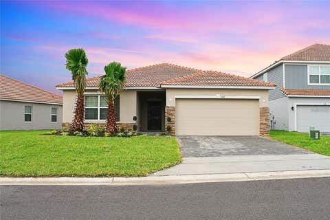 Photo of 1162 Oak Bluff Drive, Davenport, FL 33837 (MLS # O6422046)