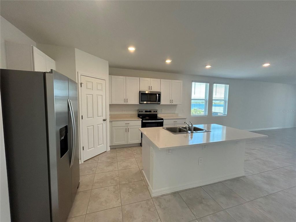 Photo of 800 Griffon Avenue, Lake Alfred, FL 33850 (MLS # O6365396)