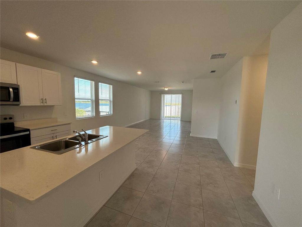 Photo of 800 Griffon Avenue, Lake Alfred, FL 33850 (MLS # O6365396)