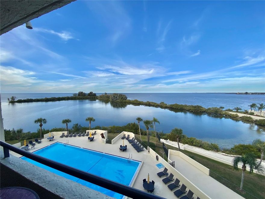 RESORT STYLE WATERFRONT LIVING! Staying here on Gulf Island you will enjoy watching the Gorgeous Summer Sunsets, dolphins play, manatee float and birds soar by from your own private covered balcony. This upgraded condo features 2 onsuite bedrooms and is offered fully furnished and equipped for your upmost pleasure. Both the living room and master bedroom offer oversized 8 ft sliding doors onto the balcony with awesome views and relaxing Gulf breezes. The unit also includes an in unit washer /dryer and under building parking space which alot of condos do not. Relax in the olympic size heated pool or on the private sandy beach overlooking the picturesque lagoon. Play and exercise in the clubhouse game rooms and waterfront fitness center. The community is "Nature's Paradise" surrounded by water with 24/7 guarded and gated entrance for your upmost security. Ideally located in quiet Hudson, close to multiple beaches and parks, restaurants, golf courses, the SunWest AquaPark, and all that the Tampa Bay and St Pete/Clearwater areas have to offer both day and night. Please view the attached virtual tours, one of the community Nature's trail, beach, pool, and clubhouse and one of the condo. Call today! Don't you deserve the "Good Life"? Rates vary depending on length of stay and time of year. Call for more details