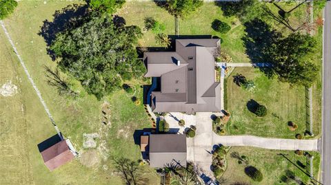 Photo of 873 SW Troy Street, Lake City, FL 32024 (MLS # OM719385)