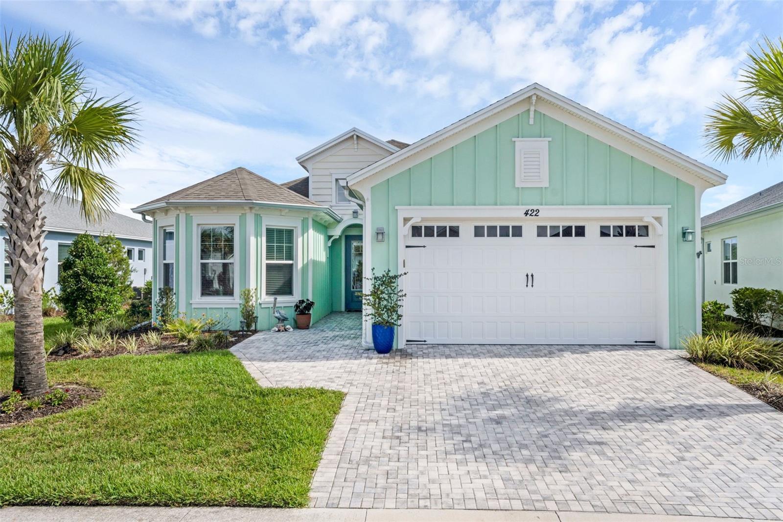 Welcome to 422 Good Life Way – Where Every Day Feels Like a Vacation!
Your island-inspired dream home awaits in the heart of Latitude Margaritaville, Daytona Beach's premier 55+ resort-style community built for fun, freedom, and Florida sunshine!
This beautifully appointed home offers the perfect blend of comfort and style with modern upgrades, light-filled living spaces, and a relaxing screened-in lanai—ideal for your morning coffee or evening cocktails. Whether you're a seasonal snowbird or making Florida your new forever home, this property is move-in ready and low-maintenance so you can focus on living the good life.
Impeccably kept, with upgraded ceramic tile floors, this rare upgraded Parrot model has 3 Bedrooms & 2 baths.
The gourmet kitchen has a large island & breakfast nook, upgraded 42 inch cabinets & quartz countertops, pull-out cabinets and a built-in beverage fridge perfect to keep your cold beverages.
Life is easy in this Open concept living room, kitchen and breakfast nook combo, plus there's a separate formal dining room for more seating.
Features a spacious, relaxing primary bedroom, overlooking the pond in the backyard, the ensuite features double walk-in closets, a large bathroom with oversized shower, double sinks and separate water closet.
Sliders lead to a large extended screened-in lanai with breathtaking water views creating a tranquil oasis. You'll live your best lanai life with a TV hook-up, plenty of space for seating, lounging and dining. It is truly the perfect setting for outdoor living and entertaining.
The 2 car garage has epoxy floors that's perfect for your car, golfcart and bikes.
The Lot is large enough and can accommodate a pool if you wish to add one.
You're not just buying a home—you're joining a community that knows how to celebrate every moment.
Your paradise starts at 422 Good Life Way. Come for the weather, stay for the lifestyle.
Latitude Margaritaville, an award-winning active 55+ community features a vibrant Town Center with a restaurant & bar, gym, indoor & outdoor pools, theater, Barkaritaville Spa and dog park, meeting rooms, woodshop and clay studio.
Activities abound with tennis, pickleball, bocce, sports fields, four heated swimming pools and regularly scheduled classes and clubs, plus daily live music by the main pool or on the stage for weekend dance parties.
Take the private shuttle to Margaritaville's own Beach Club nearby and spend a luxurious day of sun and sand, without lugging chairs and umbrellas!
The community is a golf cart ride away from groceries, hair and nail salons, a bank, vet and more. Plus, easy car access to I-95, convenient to Tanger Outlets, Daytona Motor Speedway, LPGA Championship golf and all that the Daytona/Ormond Beach area has to ofer.
But it’s not just about the home—it’s about the lifestyle. Latitude Margaritaville is a Jimmy Buffett-inspired paradise where the vibes are always laid-back and the calendar is packed with fun. 5 star Community highlights include:
Private Beach Club with shuttle access
Resort-style pool with cabanas and live music
State-of-the-art fitness center and spa
Bar & Chill Restaurant + outdoor tiki bar
Tennis, pickleball, and bocce ball courts
Town Center with concerts, dancing, arts & crafts, and more
"Information is to the best of my knowledge, please verify all info including HOA information."