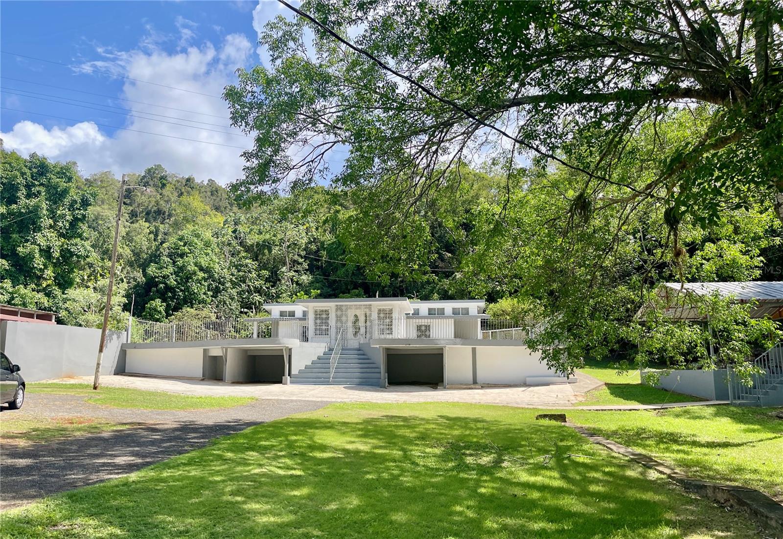 MANATI BO COTTO Two adjoining sister lots are available for sale in a combined transaction. The first lot features a one-story, concrete 4B/3B House, and the sister lot has a two-story, concrete M-Family 4B/3B property, both with concrete roofs. Both have a lot of potential! The first lot spans over a "cuerda" with 4,559 square meters. The second lot has almost two "cuerdas" with 7,824 SQMTS. These two individual properties can be converted into a combined short-term rental compound, ideal for large wedding destination groups, private events, and more. Lot II has an additional exterior concrete structure with an aluminum galvalume roof. On-site fruit trees and medicinal plants include: Aguacates, Ciruelas, Guayabas, guanabanas, granadas, mangoes, Nopal cacti, quenepas, etc. The property is a 40-minute commute from San Juan and features immediate access to neighboring commercial shopping centers, main highways, and more. One large septic tank for both properties. CASH TRANSACTION ONLY - Serious inquiries only! Thank you!