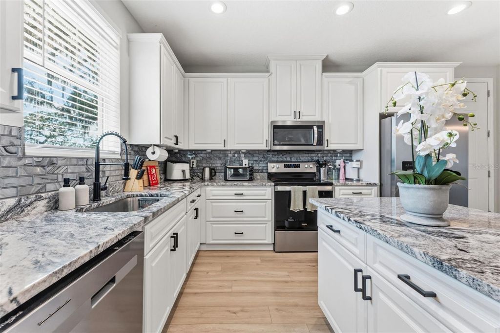 Photo of 3414 Riverview Drive, Tampa, FL 33604 (MLS # TB8486059)