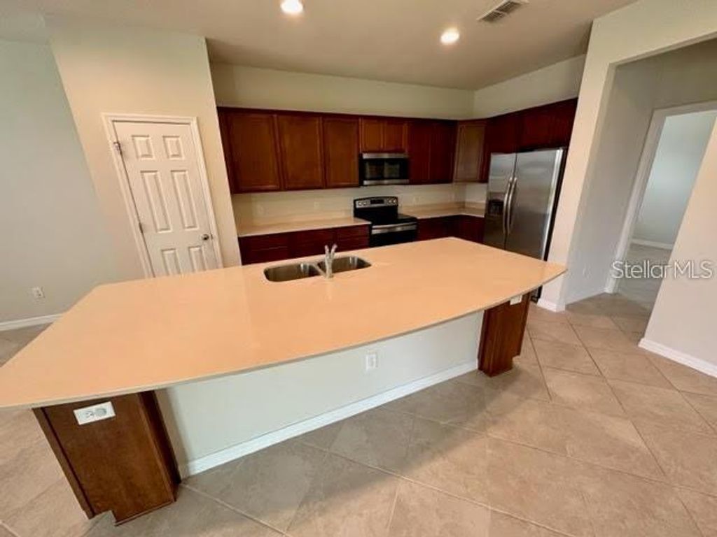 Photo of 17176 Goldcrest Loop, Clermont, FL 34714 (MLS # O6388332)