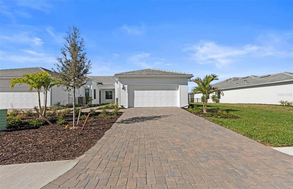 Photo of 18833 Indian Rock Place, Lakewood Ranch, FL 34211 (MLS # TB8474909)
