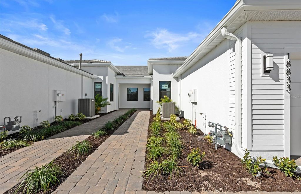 Photo of 18833 Indian Rock Place, Lakewood Ranch, FL 34211 (MLS # TB8474909)