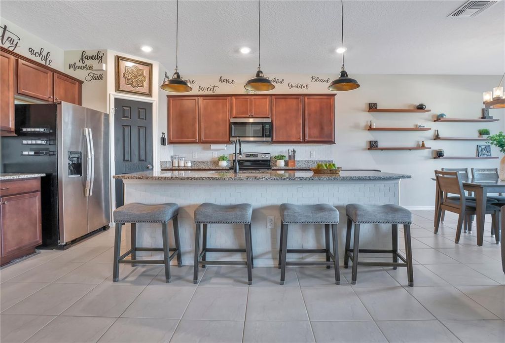 Photo of 802 Citrus Isle Drive, Davenport, FL 33837 (MLS # O6377938)