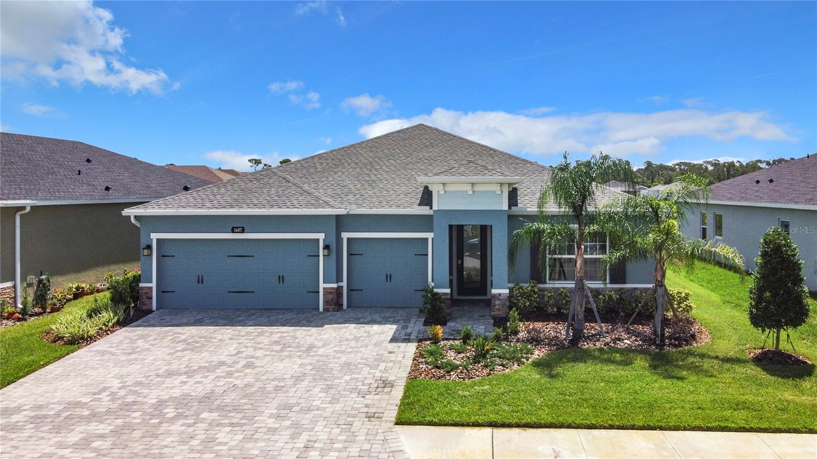 MODEL HOME FOR RENT! The builder used this model for their sales office, and this beauty is available for rent. Designer window treatments and area rugs are included! It is time for you to live in this nearly new (2022 Built) four-bedroom, three-full-bath ranch-style home! The "Sandalwood" floor plan features over 2,500 finished square feet and sets the standard for main-level luxury. A convenient entry welcomes you inside to unmatched space and style. This home is highlighted with an open-concept living area with the kitchen overlooking the dining space and the family room - ideal for entertaining. The gourmet kitchen features a full suite of stainless-steel appliances, quartz countertops, a dedicated pantry, and a center island. The large Great Room offers the laid-back life you can expect in Southwest Florida. Your luxurious Primary Suite features a double vanity, luxurious shower, and massive walk-in closet. An additional full bath sits between 2 bedrooms, while a guest suite with a full en-suite bath is found adjacent to the entry to the 3-car garage. Use the versatile additional flex space as a studio or home office. Ceiling fans are in all four bedrooms, along with the family/great room. The covered lanai overlooks a large pond just behind the home. Irrigation water is all reclaimed and provided by the community. You can live your best life in West Port with miles of trails and proximity to the 103-acre Centennial Park and Recreation Center. Family memberships are inexpensive, and there are programs and events to suit everybody. They even have an outdoor heated 25-yard competition pool with a shallow water play area, attached dive well, and a wheelchair ramp for accessibility. Don't wait and lose this opportunity. Successful applicants will pass a comprehensive background check. Small dogs upon approval. Contact the Listing Agent and arrange a showing today!