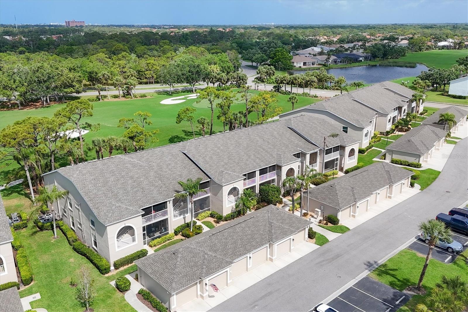 FIRST FLOOR END UNIT ABBEY CONDO - 2 BED + DEN / 2 BATH / 1 CAR GARAGE comes TURN-KEY FURNISHED and features breathtaking views of the 17th Fairway and is located steps to the neighborhood pool. * NEW ROOF (2025), A/C (2024), HOTWATER TANK (2024) *. You will love the OPEN CONCEPT floor plan that is perfect for entertaining and split bedroom arrangement which provides maximum privacy for guests. The kitchen features ALL NEW STAINLESS-STEEL APPLIANCES (2024), GRANITE COUNTERS, and a cozy dinette area. The spacious primary bedroom includes two walk-in closets and an ensuite bath with walk-in shower. A second bedroom with an adjacent bathroom is ideal for guests or additional family members. The den opens up to the great room and could easily serve as an additional guest bedroom if needed. Residents of Stoneybrook on Palmer Ranch enjoy access to a Grand clubhouse, restaurant and bar, 18-hole Arthur Hills-designed golf course, Har-Tru tennis courts, a fitness center, swimming pool, and spa. Close Siesta Key beach and charming village, The Legacy Trail, Publix grocery store, Downtown Sarasota, and Historic Venice Island Mainstreet. This condo is an ABSOLUTE MUST SEE!