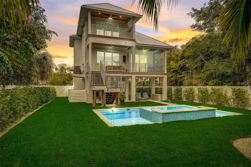 Rental projections attached and are coming in at $250,000.00 range.  One house from the Anna Maria beach . Feels like a brand new home. Welcome to your dream coastal retreat at 523 Spring Ave, Anna Maria, FL. This newly built (2021) residence boasts 3 bedrooms and a den/gym area and 3.5 bathrooms, offering a perfect blend of luxury and comfort. The property sits on a spacious 7540 SQF lot, providing ample space for relaxation and outdoor activities. This location is so key: Walk a few steps to the Beach, AMI city Pier, Water Front Restaurant, 1 scoops, shops, watch a dolphin on the pier or fish or visit The new Mote Marine Museum on the Pier or take the trolley to any where else you want to go on the island.. LOCATION< LOCATION >LOCATION.

Step inside to discover a meticulously designed interior with top-notch upgrades. The kitchen is a chef's delight, equipped with modern Wolf stainless appliances and stylish finishes- Upgrades You normally do not see in this price point. The open floor plan seamlessly connects the living and dining areas, creating an ideal space for entertaining.
Private 2 car over sized garage. 
The highlight of this property is the private oasis in the backyard—a heated pool and spa, & covered patio areas perfect for year-round enjoyment. Whether you're hosting gatherings or seeking a peaceful retreat, this outdoor space is sure to impress.

Convenience meets luxury with a 2-car garage, ensuring ample parking and storage space. Additionally, the prime location offers the convenience of being only a few steps away from the pristine beaches of Anna Maria Island and other area Restaurants, shops and the Anna Maria city pier.

Don't miss the opportunity to make this coastal paradise your own. Schedule a showing today and experience the epitome of island living!
Included features : Engineered hardwood flooring through out the home. Private elevator, Custom front door, All Hurricane windows and door through out. Heated Saltwater pool and spa with a new Haywood gas heater and auto filler salt system & Remote. Whole house generator dedicated electric panel and sub panel circuit breaker box, Travertine flooring under covered patio and in work out room and along edge of pool and spa. Wolf and Sub- Zero kitchen appliances, in ground 500 gallon propane for heating hot water, pool and spa and stovetop. Large capacity whirlpool washer & Dryer. Three covered decks with lighting, Fans in all rooms and 2 covered back decks, two walk in ELFA clostes and a large 2 car garage with storage. Foundation raised by an extra foot when it was built. Bedroom Closet Type: Walk-in Closet (Primary Bedroom).