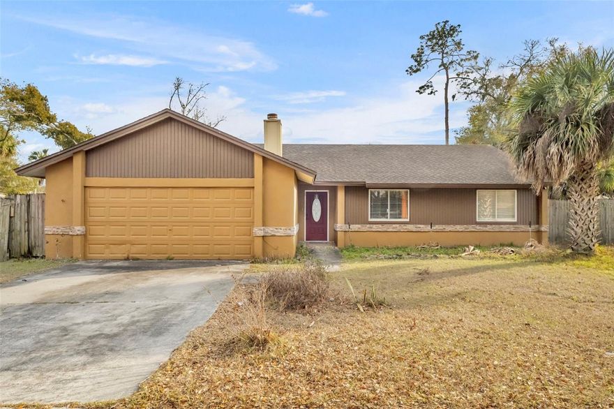 Opportunity awaits in this 3 bedroom, 2 bath home offering 1,399 SF home. Featuring an open layout with neutral tile flooring throughout the main living areas, this home provides a solid foundation for buyers looking to personalize and add value.  The kitchen offers white cabinetry, new countertops, subway tile backsplash, and a functional layout overlooking the main living space — a great starting point for your finishing touches.  The spacious living and dining areas flow to French doors leading to the backyard, allowing for natural light and indoor-outdoor potential.  The primary bedroom offers a comfortable retreat with natural light and a private en suite bath. The bathroom features a nice size walk-in closet, walk-in shower with clean white tile surround, updated vanity, and a window that allows for beautiful natural light.  The garage has been converted into additional living space and includes a designated laundry area; however, this conversion is not fully complete and will require finishing work.  This property still needs cosmetic updates and finishing touches, making it ideal for investors, renovators, or buyers with the right vision to make it their prefect home!