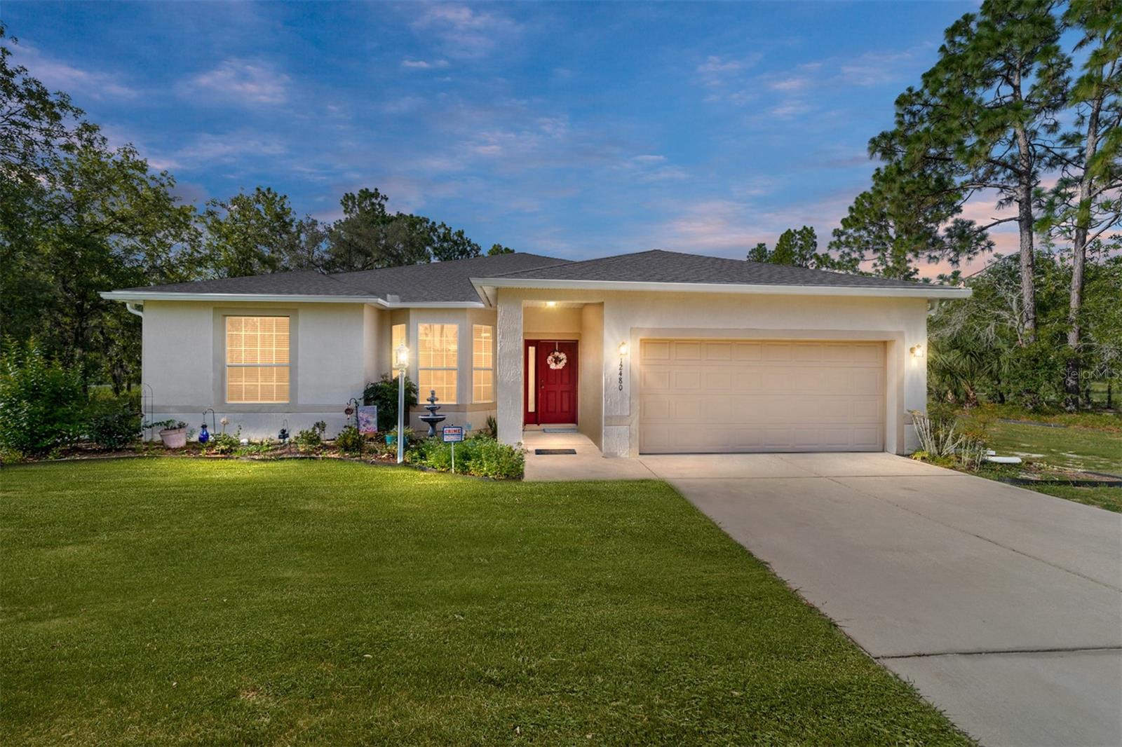 Are you looking for the country life and still only short drive from shopping, restaurants, parks, etc.? Then check out this lovely 3 bedroom, 2 bath pool home with granite counters in kitchen and bathrooms, ample entertaining space, indoor laundry, separate open outdoor patio, water filtration system and new 6" gutters. The home has fresh paint and luxury vinyl plank in wet areas. The primary suite boasts double entry doors, spacious bedroom area, soaker tub, large vanity with dual sinks, separate make-up vanity and walk-in shower. The split floor plan allows you and your guests to enjoy privacy and restful sleep. The large corner lot allows plenty of room for ATV's, boats, RV's and any other toys you may have. There is so much to see, put it on your list to view!