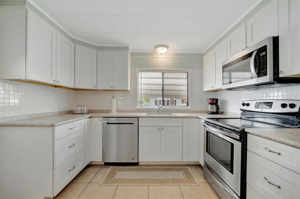 Photo of 110 E Saint Lucia Loop, Apollo Beach, FL 33572 (MLS # TB8459848)