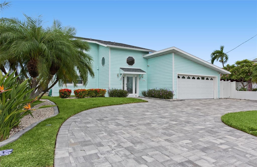 Photo of 544 Lillian Drive, Madeira Beach, FL 33708 (MLS # TB8554331)