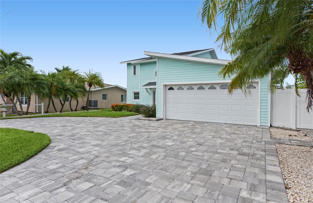 Photo of 544 Lillian Drive, Madeira Beach, FL 33708 (MLS # TB8554331)
