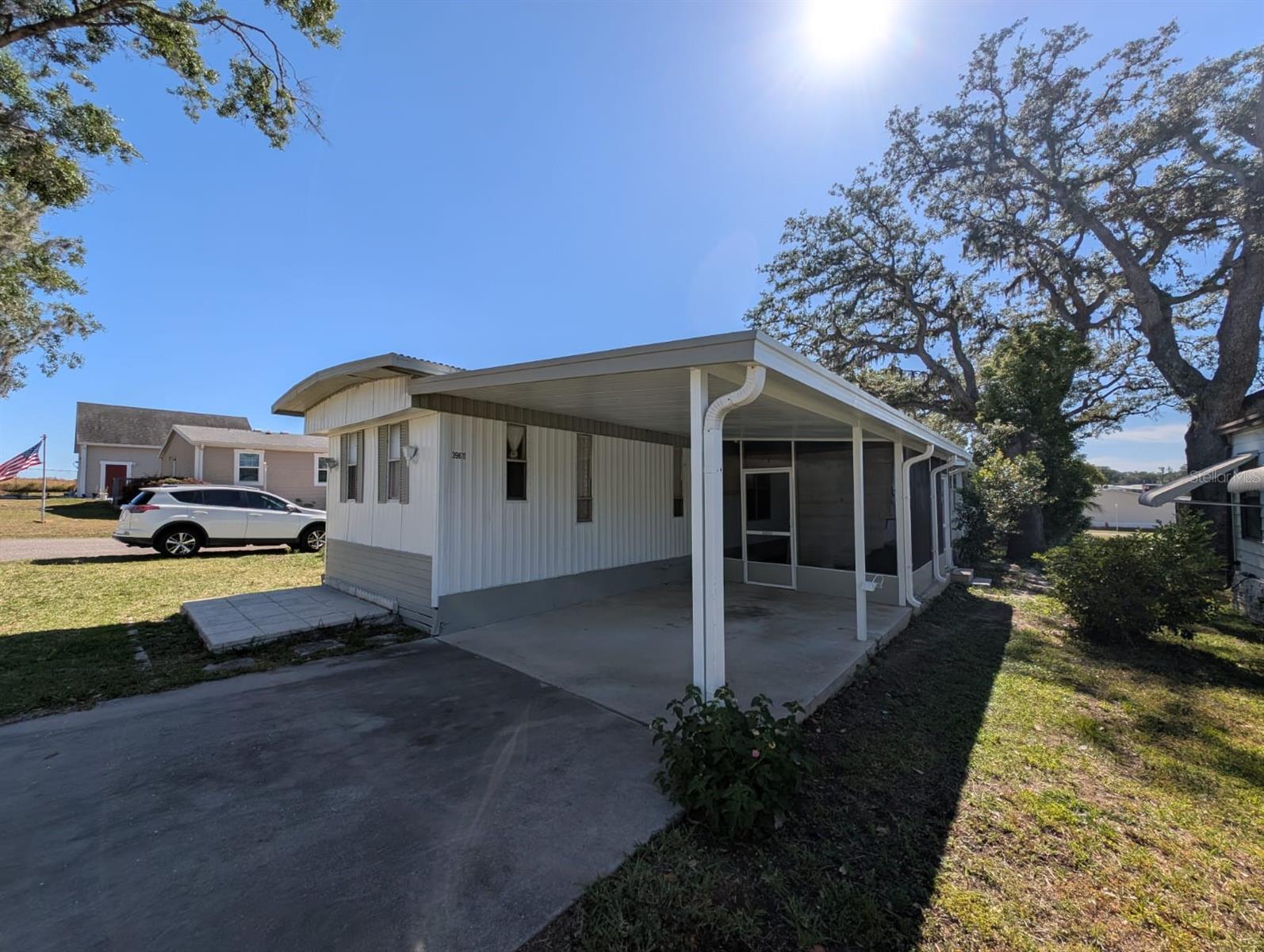 Mobile Home with Tons of Potential in Dade City! Discover the possibilities with this charming mobile home in Dade City — an excellent opportunity for investors or anyone looking to add their own special touch. This property features a spacious floor plan filled with natural light, offering plenty of room to reimagine and renovate to suit your style. Relax and unwind on the covered porch while enjoying the peaceful surroundings. Conveniently located near local shops, restaurants, and attractions, this home offers a great blend of privacy and accessibility. Whether you’re an investor or a buyer ready to make it your own, this property is full of potential don’t miss out!