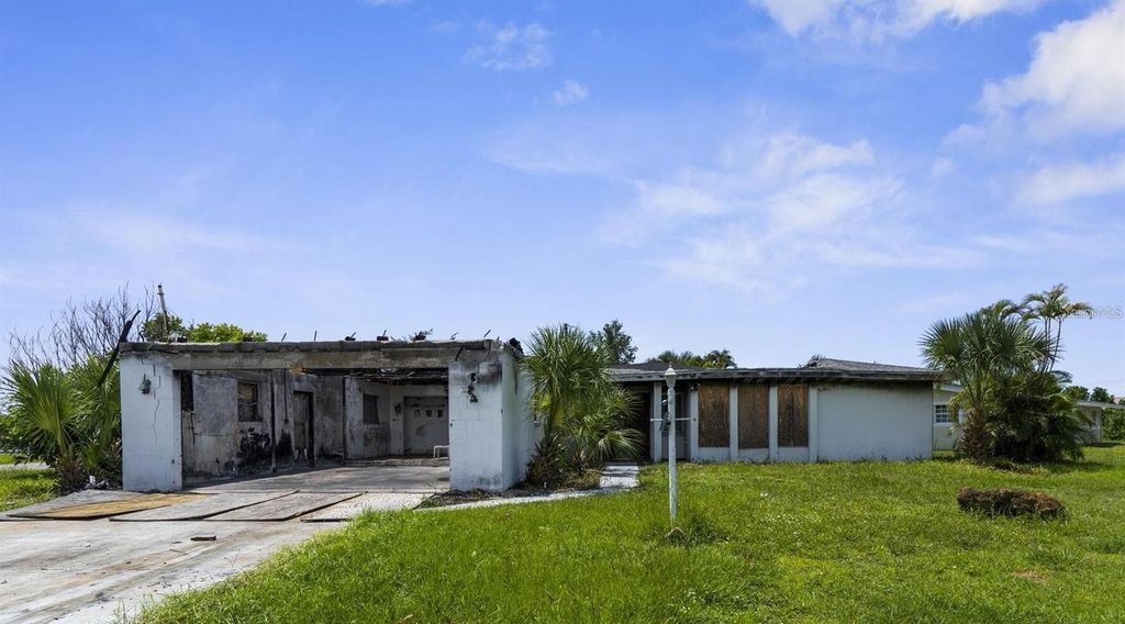 Photo of 189 Cummins Avenue NE, Port Charlotte, FL 33952 (MLS # A4669422)