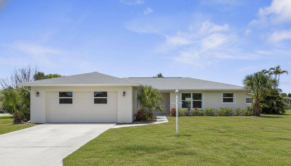 Photo of 189 Cummins Avenue NE, Port Charlotte, FL 33952 (MLS # A4669422)