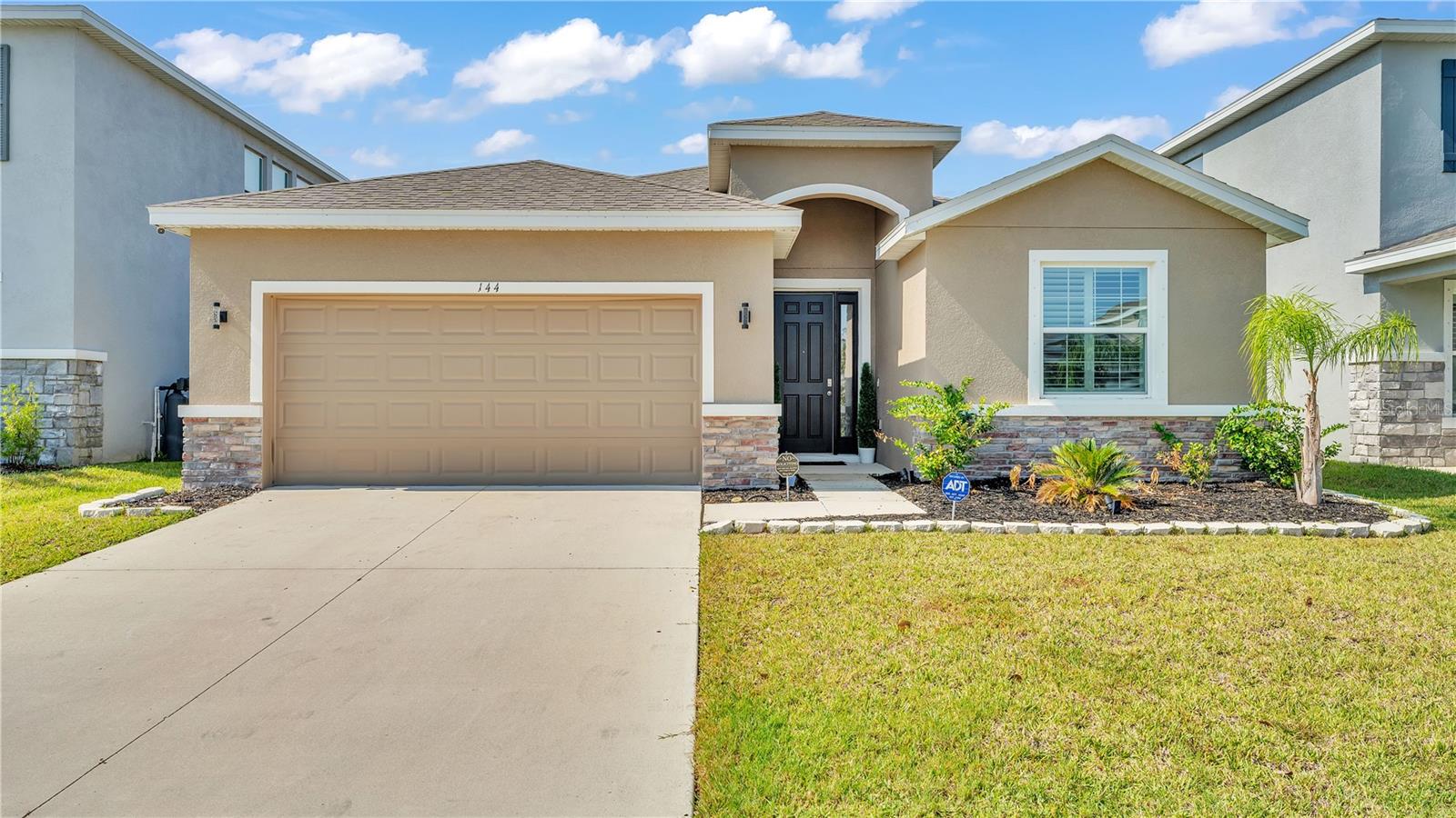 Beautiful 4 Bedroom, 2.5 Bath Home with Scenic Pond Views! This well-maintained home offers a spacious layout and a tranquil pond view, set on a fully fenced lot. The kitchen has 42” staggered-mount cabinets with crown molding, granite countertops throughout, backsplash, and stainless steel appliances — including an LG Smart Refrigerator. The garage features epoxy floors and built-in shelving, while the home includes a water softener, ceiling fans throughout, and upgraded faucets in the kitchen and master bath including upgraded toilets throughout. Enjoy Florida living from your screened lanai, or head out to the community pool just steps away. Inside, ceramic tile runs through the main living areas with carpeting in the bedrooms for comfort. Located just minutes from the Bay with easy access to Tampa, Clearwater, and Sarasota. Nearby attractions include the TECO Manatee Viewing Center, local marinas, and E.G. Simmons Park — perfect for boating, nature walks, and picnics.