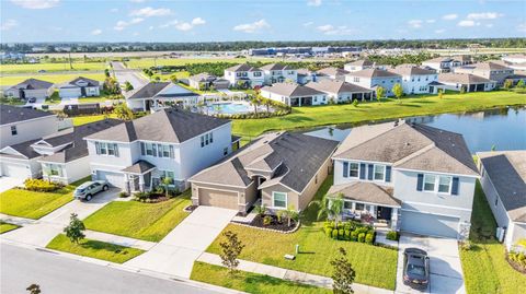 Photo of 144 Bright Ibis Avenue, Apollo Beach, FL 33572 (MLS # TB8407311)