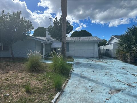 Photo of 9741 Scenic Drive, Port Richey, FL 34668 (MLS # TB8442502)