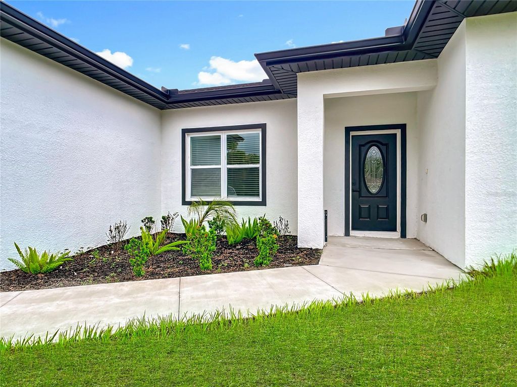 Photo of 2054 Kendis Street, Port Charlotte, FL 33948 (MLS # O6338704)