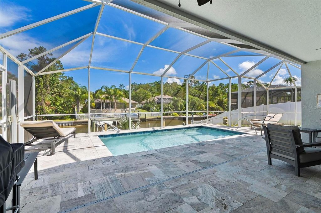 Photo of 12 Comet Court, Palm Coast, FL 32137 (MLS # FC310971)