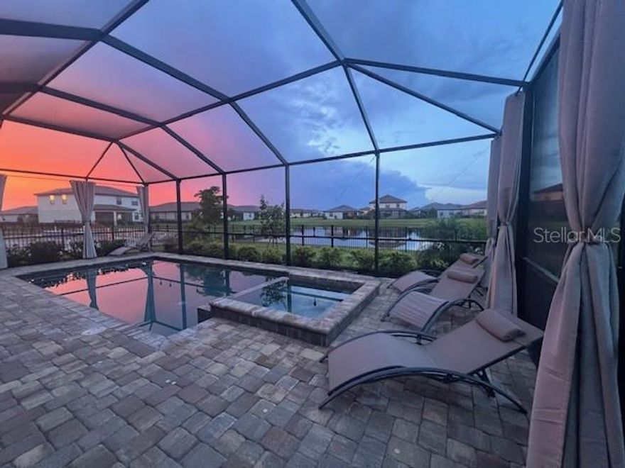 HUGE PRICE REDUCTION!! MOTIVATED SELLER!! Welcome to paradise!! Come see the LOWEST PRICED POOL HOME WITH WATER VIEW IN LORRAINE LAKES! This stunning 3 Bedroom 3 Bathroom oasis offers the perfect blend of comfort, style & tranquility. Imagine yourself enjoying the heated pool & spa with a breathtaking water view from the spacious screened lanai. Nestled on a quiet street in the highly sought after amenity-rich community of Lorraine Lakes, this is an idyllic setting for relaxation & entertainment. As you step inside, you'll be greeted by a spacious, open floor plan with high ceilings and abundant natural light. The gourmet kitchen features granite countertops, a large island, stainless steel appliances, gas stove & a huge walk-in pantry. The living area is inviting & airy with slider windows that showcase the stunning pool & pond views. The master suite is a true retreat with 2 walk-in closets and an ensuite bath featuring dual vanities & a large walk-in shower. The second bedroom features its own ensuite bathroom, making it an ideal guest room. The third bedroom can also be used as an office or den. The amenities include a restaurant & bar, 2 pools, splashpad, hot tub, saunas, social room, fitness room, TRX room, video game room, toddler play room, pickle ball, tennis, indoor & outdoor basketball courts, gym, sand volleyball, bocce ball & putting green. There is also a lifestyle director who plans many activities such as dueling pianos, theme nights, holiday events, as well as many resident-led activities such as bingo, poker, etc. The HOA fees include all of the amenities plus cable/WiFi, lawn care & full irrigation. Conveniently located in Lakewood Ranch - voted #1 master planned community 7 years in a row - with world-class beaches, dining, shopping & top-rated schools all close-by, this home truly has it all. Also it can be a perfect opportunity for snowbirds or investors because owner is offering a delayed closing or a leaseback option until February if that is desired and can be sold furnished. Don't miss your chance to own a slice of paradise!!!