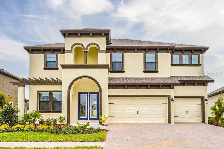 Welcome to your dream residence nestled in the heart of La Collina Gated community, where luxury living harmoniously blends with family-friendly convenience. This exceptional 5-bedroom, 4-bathroom haven boasts an array of features that promise a lifestyle of comfort, recreation, and tranquility. Step inside and be greeted by a grand foyer, leading you into the expansive open-concept living areas. The main level of this home also hosts a private guest bedroom with a bathroom, providing a retreat for visitors or the perfect option for a home gym. There is an office with built in desks and drawers that gives a modern feel. The gourmet kitchen, adorned with top-tier stainless steel appliances, amazing countertops, and a center island, beckons aspiring chefs and culinary enthusiasts alike. Adjacent to the kitchen, a spacious dining area transitions seamlessly into the warm and inviting living room, offering a perfect setting for both intimate gatherings and lively celebrations. On the second level, you'll discover a serene master suite complete with a luxurious en-suite bathroom, featuring dual sinks, a soaking tub, a separate glass-enclosed shower, and a generously sized walk-in closet. The second level also has three additional bedrooms, each thoughtfully designed and offering ample closet space, complete the upper level. Two of the bedrooms share a jack and Jill bathroom and one has a bathroom on its own. There is also a oversized media room that has endless opportunities. The exterior of this residence is equally impressive, with a sprawling fenced-in yard that promises endless possibilities for outdoor recreation and relaxation. Lush greenery surrounds the property, offering privacy and a serene backdrop for outdoor gatherings or simply unwinding after a long day. But the perks don't stop there – this remarkable community also offers an array of amenities that redefine the meaning of modern living. A sparkling community pool invites you to cool off on sunny days, while two playgrounds provide a safe and joyful haven for everyone to explore and play. For your furry companions, two dog parks with a space for them to frolic and socialize, ensuring that every member of the family feels right at home. This 5-bedroom, 4-bathroom gem offers not just a house, but a lifestyle – a rare blend of opulence, comfort, and community. Don't miss the opportunity to make this stunning residence your home, where cherished memories are waiting to be made.