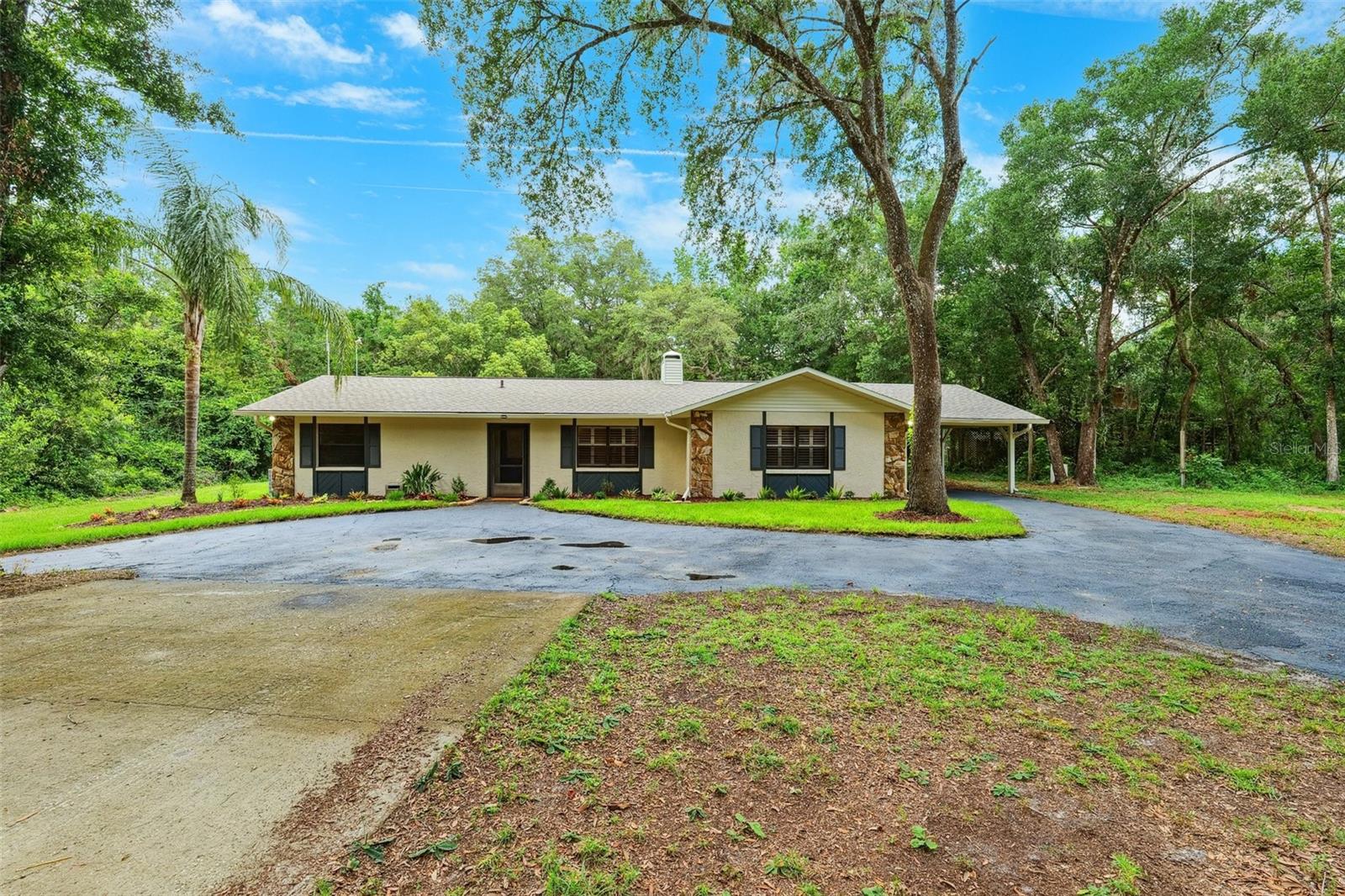 Serene 10-Acre Retreat with Modernized Home, Separate Income-Producing Mobile Home & Extensive Outbuildings Welcome to your own private slice of countryside paradise! Nestled on a lush and usable 10-acre parcel, this meticulously maintained estate offers a unique blend of comfort, functionality, and income potential. With a thoughtfully updated 3-bedroom, 2-bathroom main home, a fully rented 2-bedroom, 2-bathroom mobile home, and versatile outbuildings ideal for livestock, hobbies, or business, this rare property offers something for everyone. ?? Main Home Highlights This charming home combines classic warmth with modern updates: * New Kitchen (2020): Custom cabinetry, updated countertops, and modern appliances make cooking a pleasure. * High R-Value Attic Insulation (2021): Energy-efficient and climate-conscious. * High-Efficiency HVAC (2022): Keeps the home comfortable year-round while reducing utility costs. * New Roof (2025): Recently installed for peace of mind and longevity. * New Water Heater (2025) & New Well Pressure Tank (2024): Dependable and efficient utility systems. * Refinished Wood Floors (2025): Beautiful hardwood shines in the bedrooms, hallway, and living room. * Fresh Interior and Exterior Paint (2025): Move-in ready with a crisp, updated look throughout. * Plantation Shutters (2024): Elegant window treatments add style and energy efficiency. * Driveway Recoated (2025): Circular driveway offers ample parking and a polished appearance. * Generator-Ready: The main circuit breaker panel is prepped for easy generator connection—ideal for rural living peace of mind. ??? Outbuildings & Land Features Whether you're an equestrian, hobbyist, or entrepreneur, this property is equipped to serve: * Classic Barn: Includes livestock stables, a spacious open workshop downstairs, and a large open upstairs loft room - perfect for storage, studio, or conversion potential. * Pole Barn: Built tall to accommodate an RV or camper with dedicated electrical hookup. * Additional Electrical Hookup Pad: Conveniently located at the front of the home between the circular drive—ideal for guests or additional RV/camper use. ??? Income-Producing Mobile Home Located on the same property is a separate 2-bedroom, 2-bath mobile home currently rented to stable tenants—providing instant income or space for extended family or guests. Address: 22396 Bull Run Rd. ?? The Land * 10 beautiful acres with a mixture of open areas and shade, ideal for livestock, gardening, recreation, or just enjoying the peace and privacy of country living. * Plenty of room to expand, create walking trails, or add additional structures. ?? Location Peacefully situated, yet still within reach of nearby conveniences, shopping, and schools. Whether you're looking for a quiet retreat, a multigenerational homestead, or an income-producing property, 22460 Chenoak Rd delivers unmatched versatility and value. Don't miss this rare opportunity to own a turn-key country estate with modern comforts and revenue potential—schedule your private showing today!