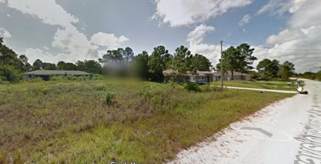 Photo of 921 Graystone Avenue, Lehigh Acres, FL 33974 (MLS # O6362233)
